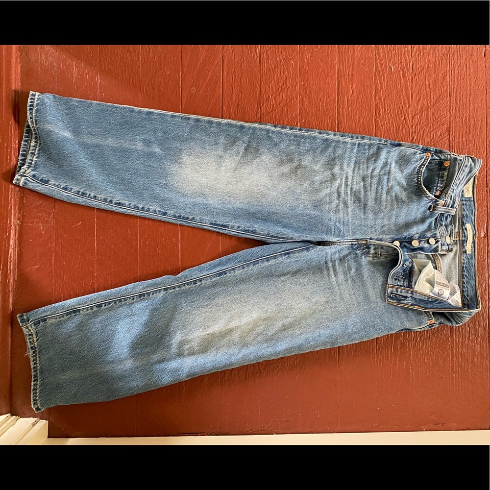 Levi’s ribcage straight cut —- feels like a wide leg high rise jean light wash
